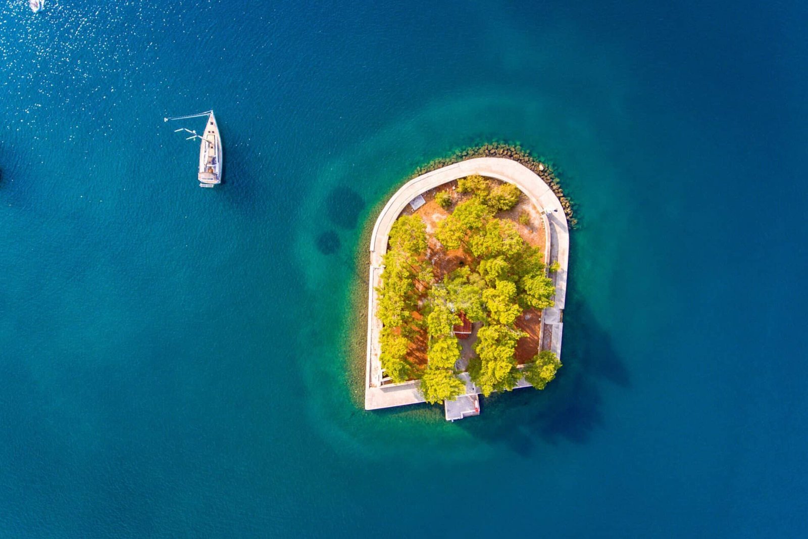 Vathy Ithaca (Ithaka) harbour entrance with famous small Church Vathy Ithaca (Ithaka) harbour entrance with famous small Church